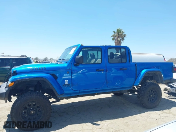2022 Jeep Gladiator Texas Trail with VIN 1C6HJTAG4NL135346, listed as a IAAI auction lot 42824733 with 40,126 mi miles and . Bid and sale history available at DreamBid. Image 14.
