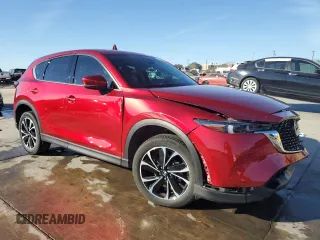 2022 Mazda CX-5 2.5 S Premium Plus Package with VIN JM3KFBEM0N1548636, listed as a Copart auction lot 77492254 with 22,220 mi miles and Non Repairable. Bid and sale history available at carsss.com. Image 4.