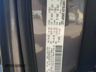 2014 Dodge Grand Caravan SE with VIN 2C4RDGBG3ER365770, listed as a Copart auction lot 47569235 with 162,028 mi miles and Salvage Title. Bid and sale history available at DreamBid. Image 13.