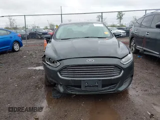 2015 Ford Fusion SE Hybrid with VIN 3FA6P0LU9FR184907, listed as a IAAI auction lot 42119737 with 153,255 mi miles and . Bid and sale history available at DreamBid. Image 13.