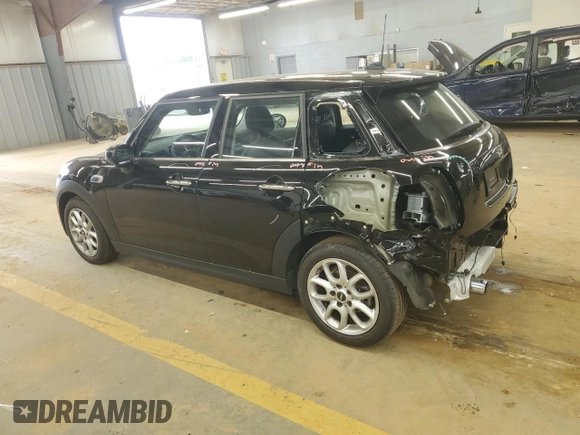 2021 MINI Hardtop 4 Door Oxford Edition with VIN WMWXU7C08M2N79978, listed as a Copart auction lot 61961105 with 29,714 mi miles and Salvage title. Bid and sale history available at DreamBid. Image 2.