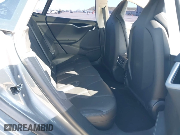 2014 Tesla Model S 60 with VIN 5YJSA1S10EFP32851, listed as a IAAI auction lot 41730746 with 91,657 mi miles and . Bid and sale history available at DreamBid. Image 8.