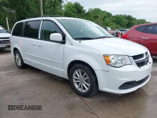 2015 Dodge Grand Caravan SXT with VIN 2C4RDGCG2FR548433, listed as a IAAI auction lot 42121256 with 161,459 mi miles and . Bid and sale history available at DreamBid. Image 1.