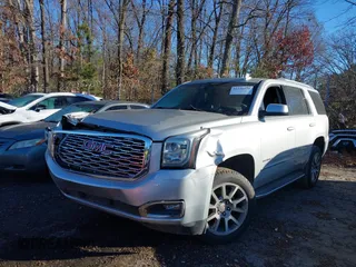 2018 GMC Yukon Denali with VIN 1GKS1CKJ9JR241330, listed as a IAAI auction lot 41180538 with 100,300 mi miles. Bid and sale history available at carsss.com. Image 2.