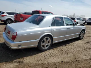 2004 Bentley Arnage z VIN SCBLF34F44CX09923, wystawiony jako Copart lot #52712015 z przebiegiem Nie podano mil oraz Tytuł czysty. Historia ofert i sprzedaży dostępna na DreamBid. Obrazek 3.