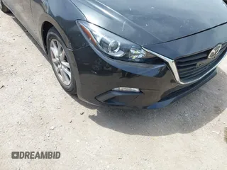 2014 Mazda 3 i Grand Touring z VIN JM1BM1M75E1151329, wystawiony jako IAAI lot #42248334 z przebiegiem 138 748 mil mil oraz . Historia ofert i sprzedaży dostępna na DreamBid. Obrazek 6.
