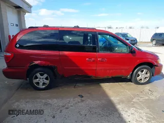 2005 Dodge Grand Caravan with VIN 2D4G944L75R310409, listed as a IAAI auction lot 41781132 with 128,120 mi miles and . Bid and sale history available at DreamBid. Image 13.