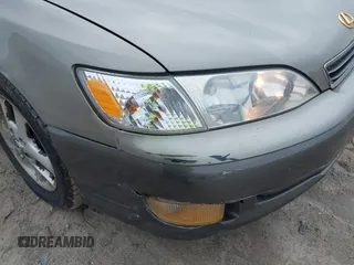 2001 Lexus ES 300 с VIN JT8BF28G910332295, выставлен на аукционе IAAI как лот 42534512 с пробегом 118 915 миль миль и . История ставок и продаж доступна на DreamBid. Изображение 6.