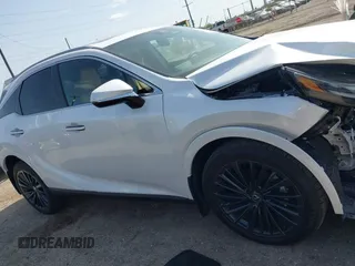 2024 Lexus RX 350 z VIN 2T2BAMBA8RC050498, wystawiony jako IAAI lot #41826928 z przebiegiem 1822 mil mil oraz . Historia ofert i sprzedaży dostępna na DreamBid. Obrazek 13.