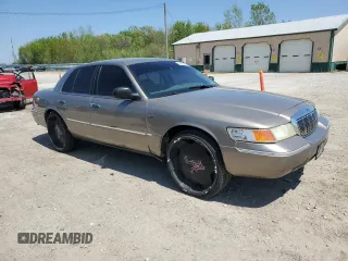 2001 Mercury Grand Marquis LS z VIN 2MEFM75W11X612617, wystawiony jako Copart lot #54782295 z przebiegiem 171 944 mil mil oraz Szkoda całkowita • Salvage title. Historia ofert i sprzedaży dostępna na DreamBid. Obrazek 4.