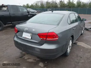 2012 Volkswagen Passat S w/Appearance with VIN 1VWAH7A34CC029189, listed as a IAAI auction lot 41110389 with 162,406 mi miles. Bid and sale history available at carsss.com. Image 4.