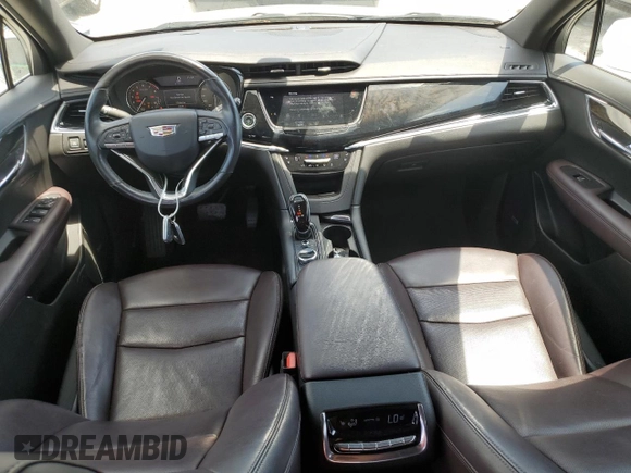 2020 Cadillac XT6 FWD Premium Luxury z VIN 1GYKPCRS7LZ235645, wystawiony jako Copart lot #58977995 z przebiegiem 42 504 mil mil oraz Nie do naprawy • Non repairable. Historia ofert i sprzedaży dostępna na DreamBid. Obrazek 8.