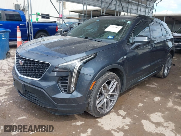 2019 Cadillac XT4 FWD Sport z VIN 1GYFZER49KF215843, wystawiony jako IAAI lot #41912861 z przebiegiem 102 922 mil mil oraz . Historia ofert i sprzedaży dostępna na DreamBid. Obrazek 21.