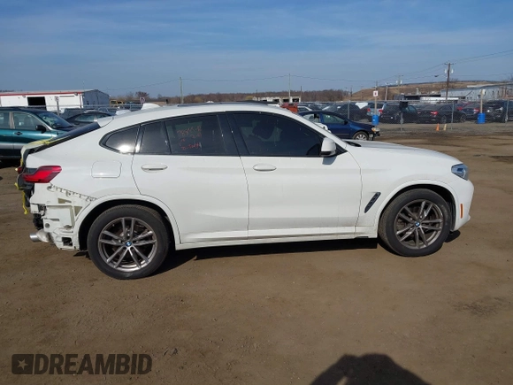 2021 BMW X4 xDrive30i z VIN 5UX2V1C01M9F26524, wystawiony jako IAAI lot #41805153 z przebiegiem 40 353 mil mil oraz . Historia ofert i sprzedaży dostępna na DreamBid. Obrazek 14.