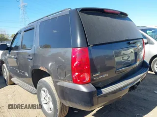 2011 GMC Yukon SLE with VIN 1GKS2AE04BR207818, listed as a IAAI auction lot 40669731 with 312,959 mi miles. Bid and sale history available at carsss.com. Image 3.