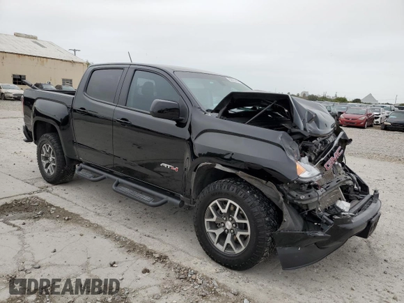 2022 GMC Canyon 4WD AT4 w/Leather with VIN 1GTG6FEN2N1294071, listed as a Copart auction lot 84652954 with 53,076 mi miles and Salvage Title. Bid and sale history available at carsss.com. Image 4.