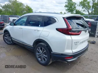 2020 Honda CR-V Touring z VIN 2HKRW2H97LH676151, wystawiony jako IAAI lot #42340956 z przebiegiem 32 492 mil mil oraz . Historia ofert i sprzedaży dostępna na DreamBid. Obrazek 3.