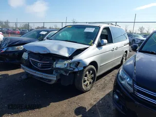 2004 Honda Odyssey EX with VIN 5FNRL18664B051006, listed as a IAAI auction lot 41967247 with 275,047 mi miles and . Bid and sale history available at DreamBid. Image 18.