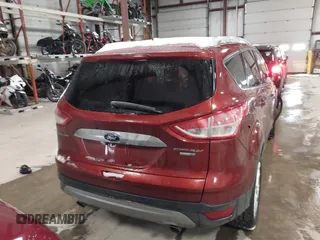 2016 Ford Escape Titanium with VIN 1FMCU9JX6GUB57497, listed as a IAAI auction lot 41375019 with 1 mi miles. Bid and sale history available at carsss.com. Image 16.