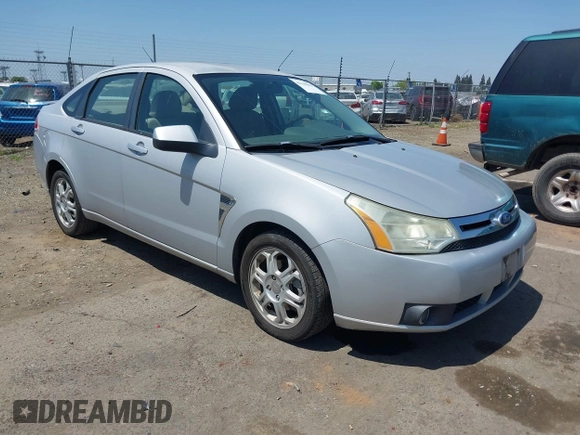 2008 Ford Focus SE with VIN 1FAHP35N28W300528, listed as a IAAI auction lot 42149643 with 138,115 mi miles. Bid and sale history available at carsss.com. Image 1.