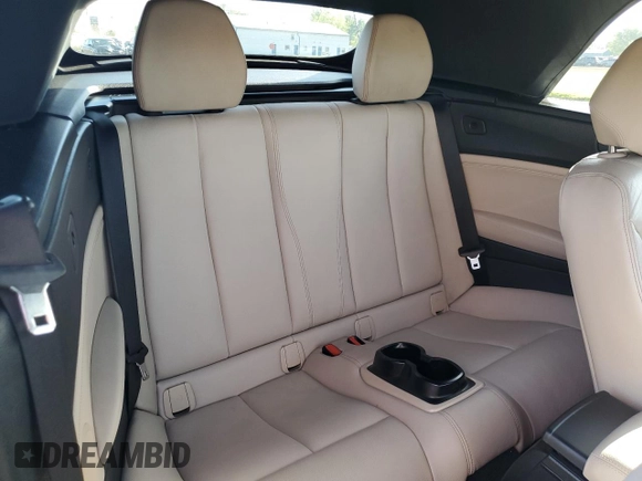 2015 BMW 2 Series 228i with VIN WBA1K5C51FV474079, listed as a Copart auction lot 57457875 with 62,946 mi miles and Salvage title. Bid and sale history available at DreamBid. Image 10.