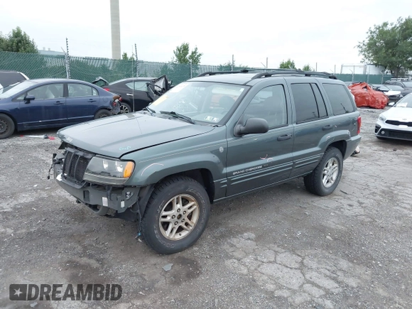 2004 Jeep Grand Cherokee Laredo with VIN 1J4GW48S24C276284, listed as a IAAI auction lot 42596655 with 142,524 mi miles and . Bid and sale history available at DreamBid. Image 2.