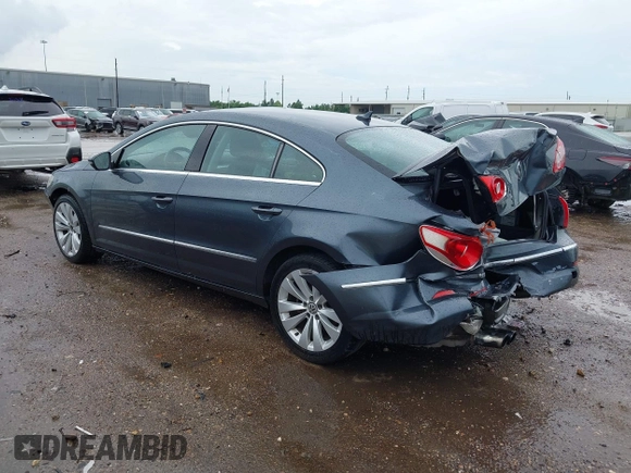 2009 Volkswagen CC Sport with VIN WVWML73C79E553395, listed as a IAAI auction lot 42078061 with 167,110 mi miles. Bid and sale history available at carsss.com. Image 3.
