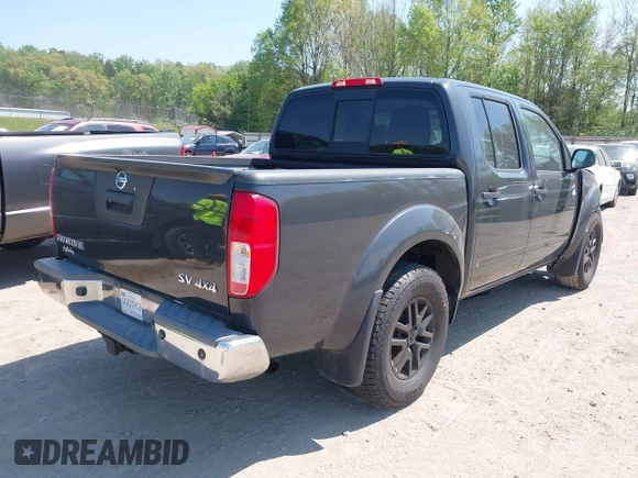 2014 Nissan Frontier SV with VIN 1N6AD0EV6EN729351, listed as a IAAI auction lot 42072768 with 149,158 mi miles and . Bid and sale history available at DreamBid. Image 4.