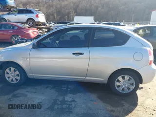 2007 Hyundai Accent GS with VIN KMHCM36C97U043769, listed as a IAAI auction lot 41526011 with 230,566 mi miles. Bid and sale history available at carsss.com. Image 14.