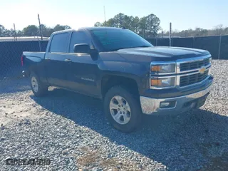 2014 Chevrolet Silverado 1500 LT with VIN 3GCUKREC6EG553001, listed as a IAAI auction lot 41415936 with 254,622 mi miles. Bid and sale history available at carsss.com. Image 1.
