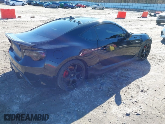 2014 Scion FR-S z VIN JF1ZNAA14E9708590, wystawiony jako IAAI lot #41278089 z przebiegiem 117 357 mil mil oraz . Historia ofert i sprzedaży dostępna na DreamBid. Obrazek 4.