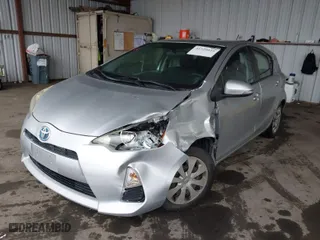 2012 Toyota Prius c One with VIN JTDKDTB34C1005531, listed as a IAAI auction lot 41529024 with 195,916 mi miles. Bid and sale history available at carsss.com. Image 6.