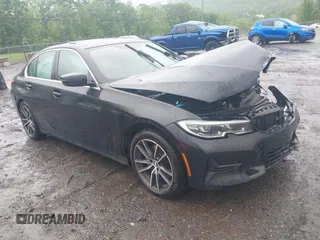 2020 BMW 3 Series 330i xDrive with VIN 3MW5R7J0XL8B06577, listed as a IAAI auction lot 42258034 with 303,224 mi miles and . Bid and sale history available at DreamBid. Image 1.