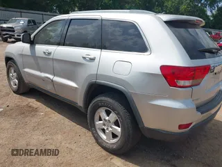 2012 Jeep Grand Cherokee Laredo with VIN 1C4RJEAG4CC251359, listed as a IAAI auction lot 41986762 with 172,331 mi miles. Bid and sale history available at carsss.com. Image 3.