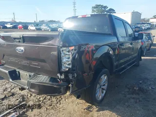 2018 Ford F-150 XL with VIN 1FTEW1C50JFA26307, listed as a IAAI auction lot 41091268 with 129,012 mi miles and . Bid and sale history available at DreamBid. Image 4.