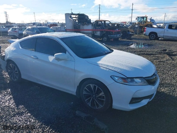 2016 Honda Accord Coupe EX-L with VIN 1HGCT1B89GA008486, listed as a IAAI auction lot 41114706 with 104,590 mi miles. Bid and sale history available at carsss.com. Image 1.