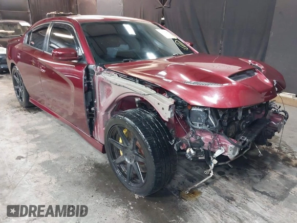 2019 Dodge Charger SRT Hellcat with VIN 2C3CDXL92KH693077, listed as a IAAI auction lot 39361432 with 57,522 mi miles and . Bid and sale history available at DreamBid. Image 1.