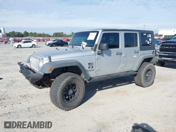 2007 Jeep Wrangler Unlimited X with VIN 1J4GB39147L199367, listed as a IAAI auction lot 40897772 with 229,309 mi miles and . Bid and sale history available at DreamBid. Image 17.