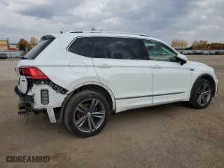2020 Volkswagen Tiguan SEL Premium R-Line with VIN 3VV4B7AX8LM033024, listed as a Copart auction lot 77354494 with 127,247 mi miles and Salvage Title. Bid and sale history available at carsss.com. Image 3.