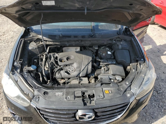 2016 Mazda CX-5 Grand Touring with VIN JM3KE2DY4G0761993, listed as a Copart auction lot 53204265 with 184,249 mi miles and Clean Title. Bid and sale history available at carsss.com. Image 12.