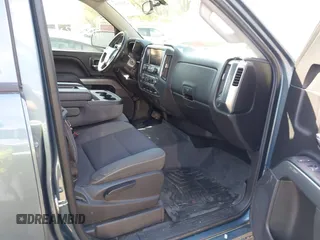 2014 Chevrolet Silverado 1500 LT with VIN 3GCUKREH9EG313565, listed as a IAAI auction lot 42003086 with 112,322 mi miles and . Bid and sale history available at DreamBid. Image 5.