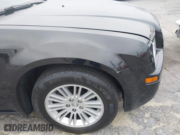 2009 Chrysler 300 LX with VIN 2C3KA43D19H506753, listed as a IAAI auction lot 42053199 with 106,092 mi miles. Bid and sale history available at carsss.com. Image 16.
