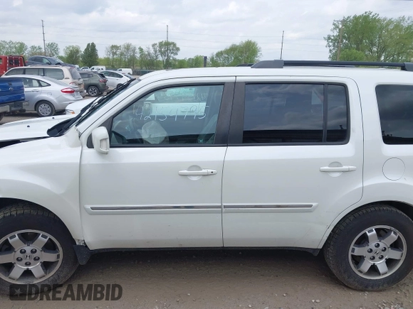 2011 Honda Pilot Touring z VIN 5FNYF4H96BB106873, wystawiony jako IAAI lot #42154795 z przebiegiem 162 282 mil mil oraz . Historia ofert i sprzedaży dostępna na DreamBid. Obrazek 14.