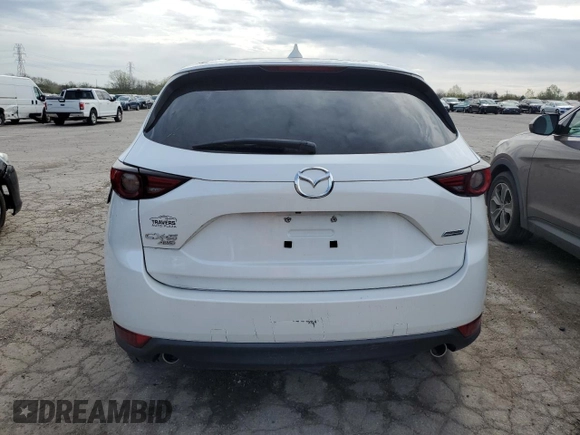 2018 Mazda CX-5 Grand Touring with VIN JM3KFBDM6J0421228, listed as a Copart auction lot 54915685 with Not Provided miles and Clean Title. Bid and sale history available at DreamBid. Image 6.