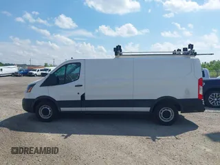 2021 Ford Transit Cargo with VIN 1FTYE1Y80MKA75151, listed as a IAAI auction lot 42577609 with 91,623 mi miles and . Bid and sale history available at DreamBid. Image 14.