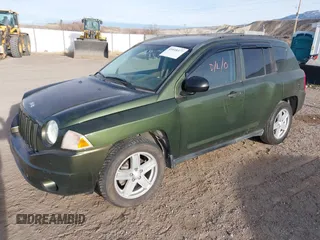 2007 Jeep Compass Sport with VIN 1J8FF47W77D199182, listed as a IAAI auction lot 41818377 with 147,125 mi miles. Bid and sale history available at carsss.com. Image 2.