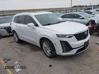 2021 Cadillac XT6 Premium Luxury with VIN 1GYKPCRSXMZ169206, listed as a IAAI auction lot 41581841 with 64,789 mi miles and . Bid and sale history available at carsss.com. Image 1.