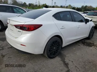 2016 Mazda 3 i Touring z VIN JM1BM1W70G1299548, wystawiony jako Copart lot #52575085 z przebiegiem 136 964 mil mil oraz Szkoda całkowita • Salvage title. Historia ofert i sprzedaży dostępna na DreamBid. Obrazek 3.