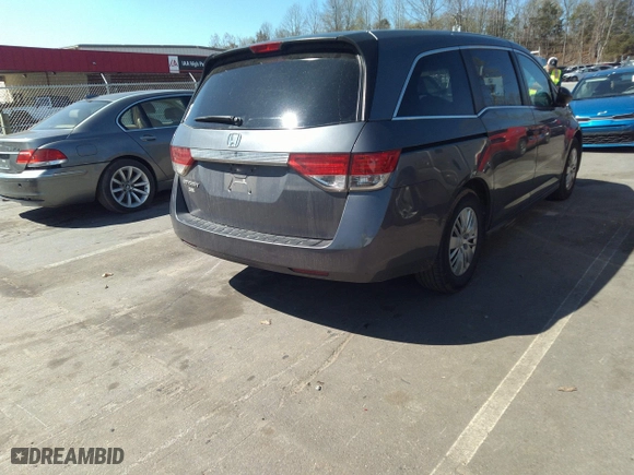 2014 Honda Odyssey LX with VIN 5FNRL5H24EB025817, listed as a IAAI auction lot 41904759 with 161,523 mi miles. Bid and sale history available at carsss.com. Image 4.