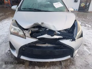 2015 Toyota Yaris L with VIN VNKJTUD36FA036518, listed as a IAAI auction lot 41233406 with 138,481 mi miles. Bid and sale history available at carsss.com. Image 6.